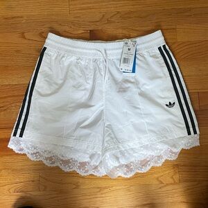Adidas women’s lace trim shorts Sz medium